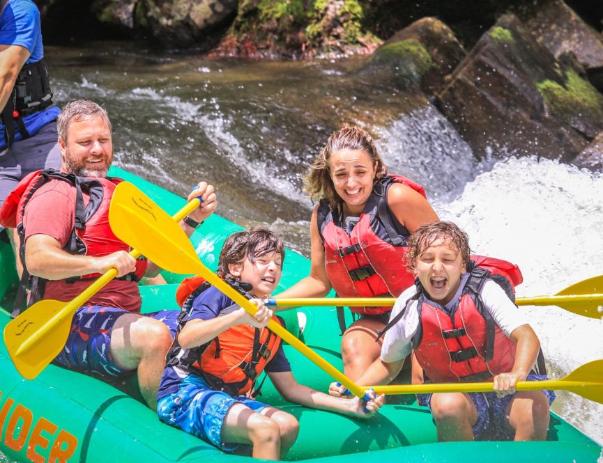 Mom, Dad and two boys enjoying the Nantahala rafting trip.