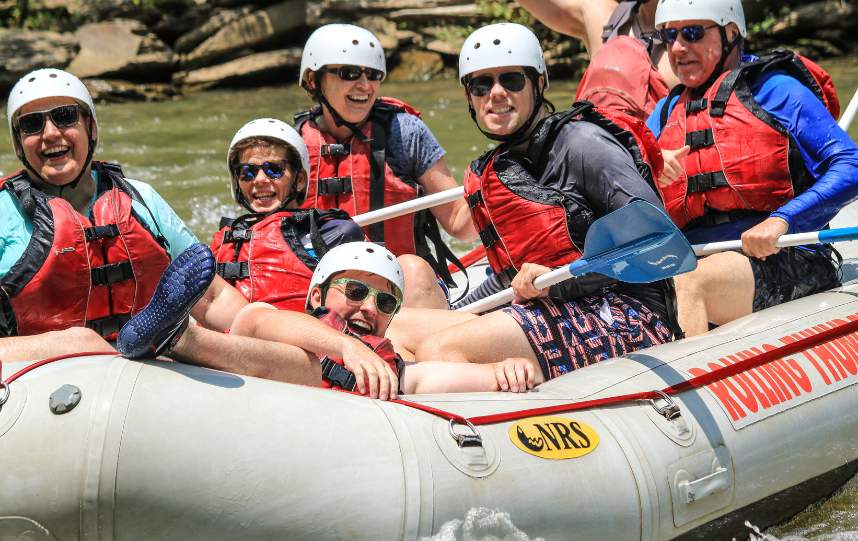 group of guys rafting ocoee river